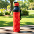 Travel-friendly sports water bottle with attached carry strap