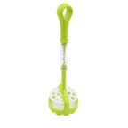 The versatile potato masher shown mashing sweet potatoes in a bowl.