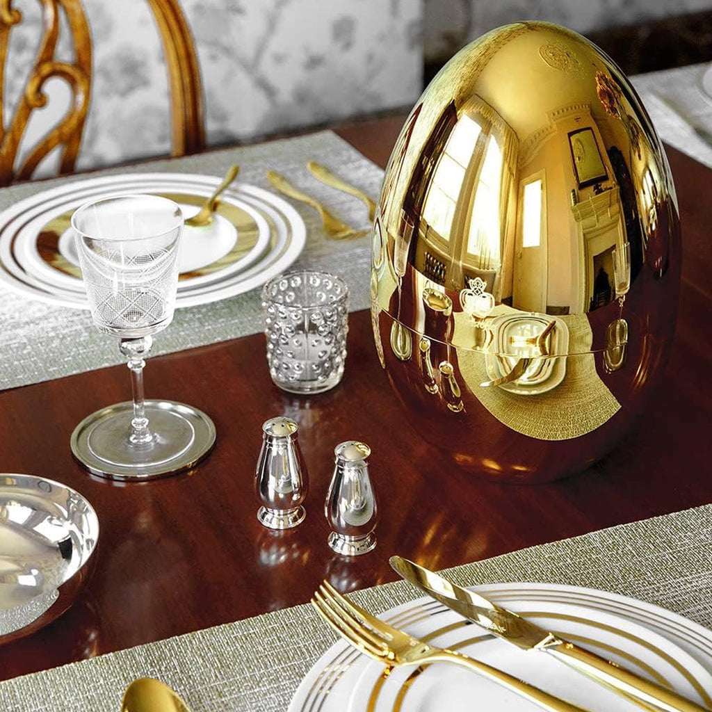 Golden forks beautifully arranged in the stylish oval cutlery holder.