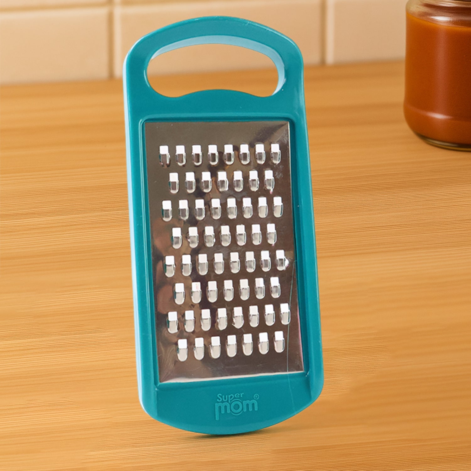 Compact design of Supermom multipurpose cheese and vegetable grater for easy storage