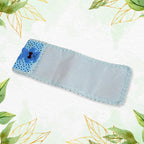 Protective cloth remote cover with a charming cartoon pattern and lace details.