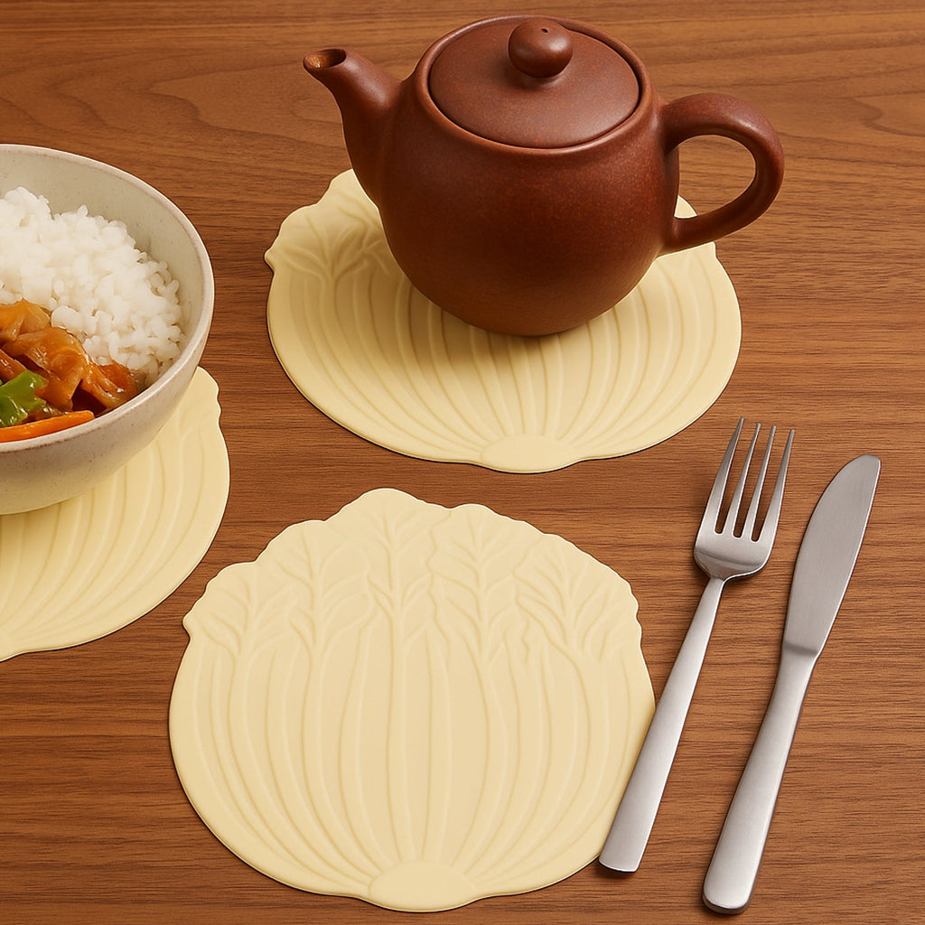 Packaged 2-piece silicone leaf coaster set in transparent wrapping