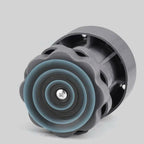 A washing machine with anti-vibration pads underneath, illustrating easy cleaning access to the floor.