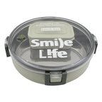 An adult holding the sleek Miracle Stainless Steel Lunch Box, ideal for office or school lunches.
