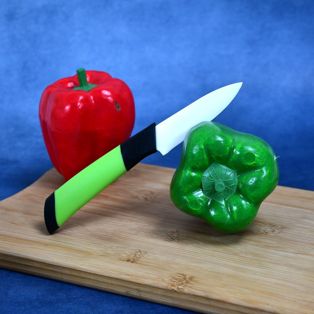 Fresh fruit being peeled effortlessly with the rust-resistant ceramic peeler.