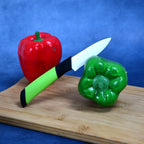 Fresh fruit being peeled effortlessly with the rust-resistant ceramic peeler.