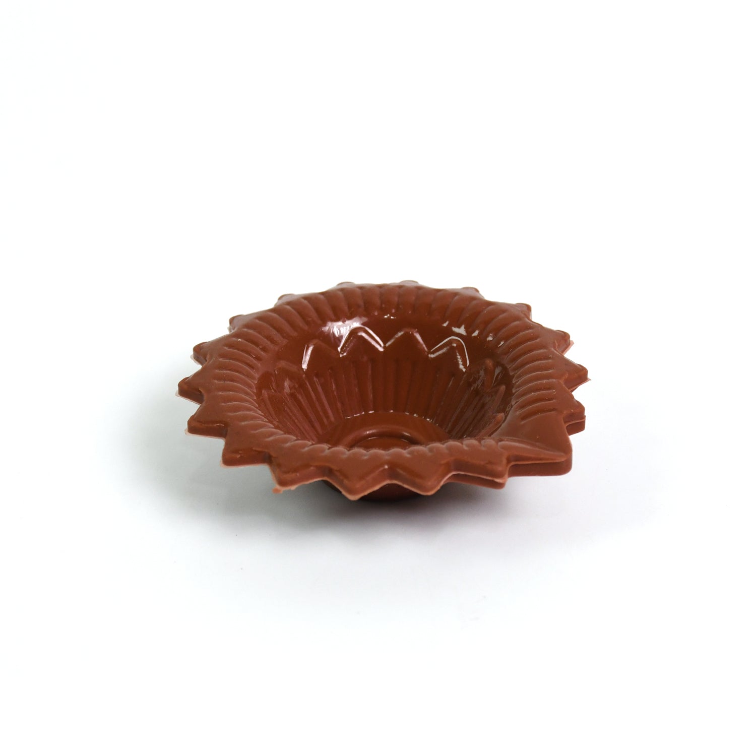 A single, beautifully crafted colourful silicone diya ready for festive lighting on Diwali.