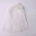 Reusable mesh storage bag showing detailed drawstring mechanism