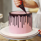 An array of stainless steel nozzles and a clear disposable piping bag for frosting.