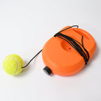 Person practicing with the Tennis Rebound Trainer on a tennis court.