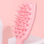 Soft bristle scalp massager designed for gentle cleansing