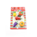 Various mixed design erasers scattered on a surface, showcasing the wide variety available in the set.