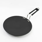 Close-up of the heat-resistant handle on non-stick tawa