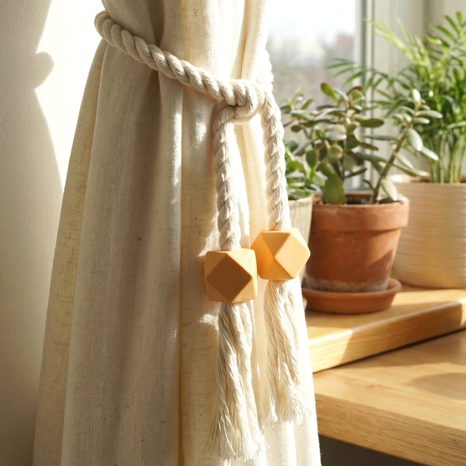 Reusable magnetic curtain accessory holding drapes neatly in place.