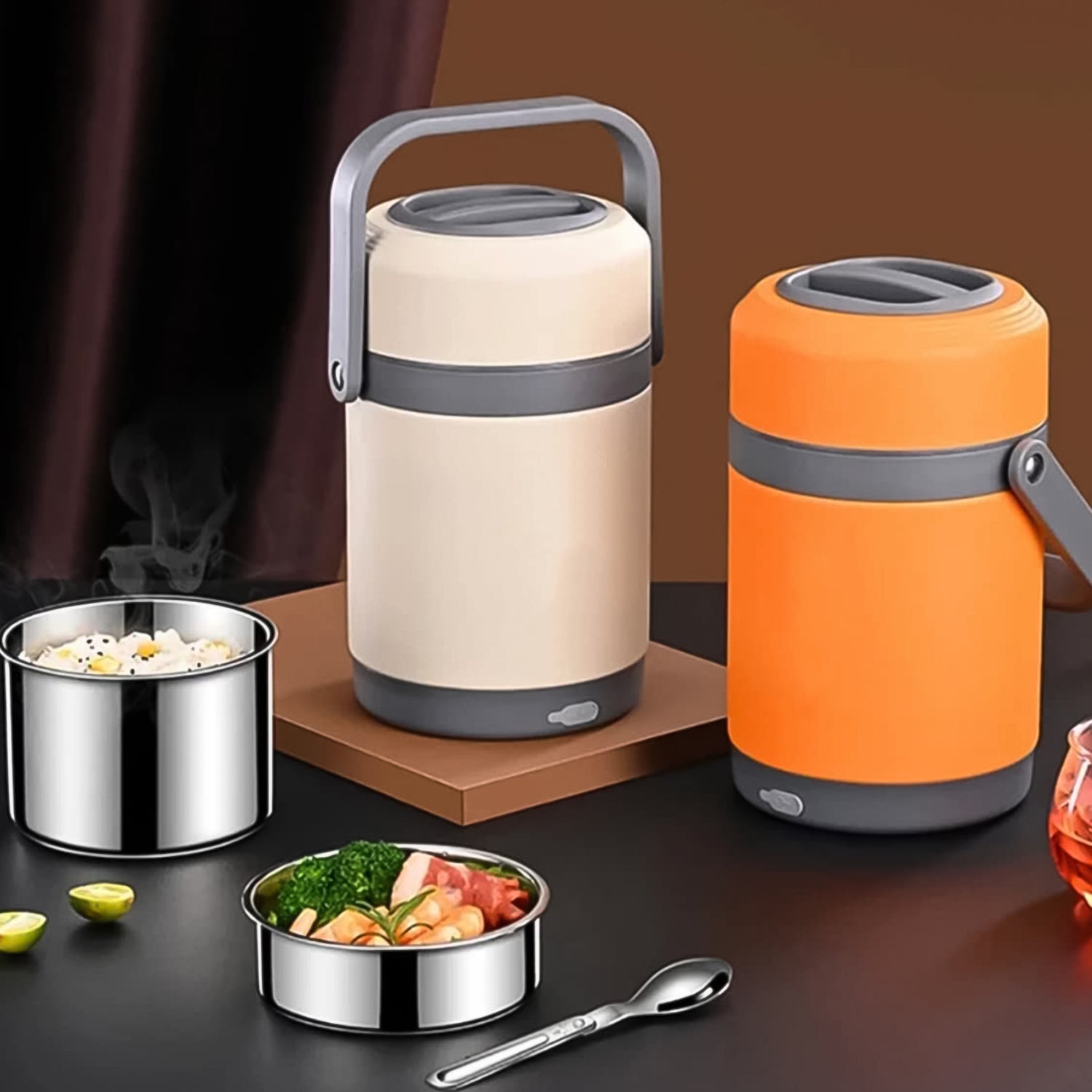 Person enjoying a warm meal from the portable electric lunch box at their desk.