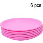 Stack of round mini soup plates showcasing their compact size.