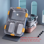 Complete stainless steel lunch box set with a spoon and chopsticks, ready for meals.