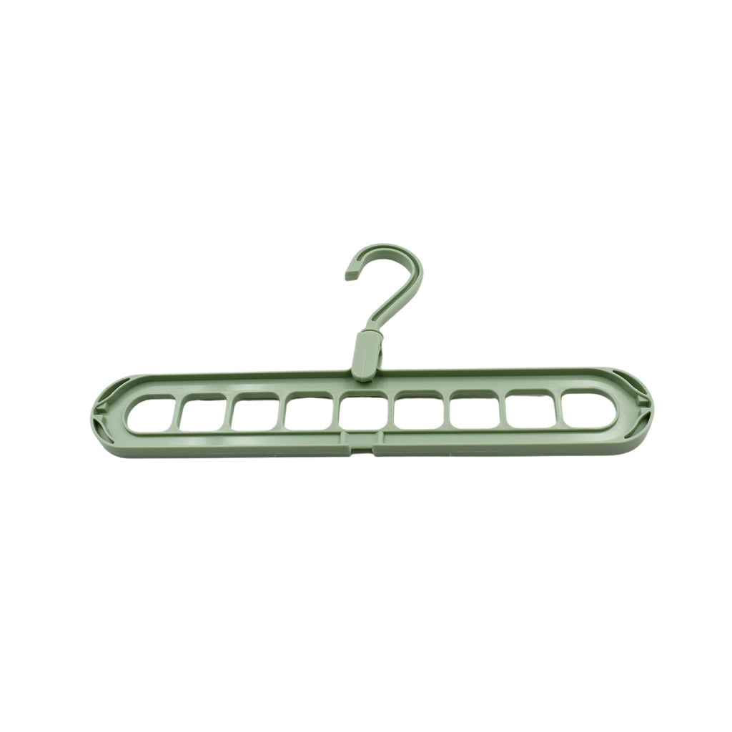 Organized wardrobe interior with multi-hole plastic hangers maximizing storage space.
