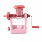 Angled view of manual juice extractor with large feeding tube