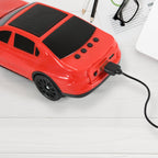 Car Shape Wireless Speaker being held, demonstrating its portability and ergonomic design.
