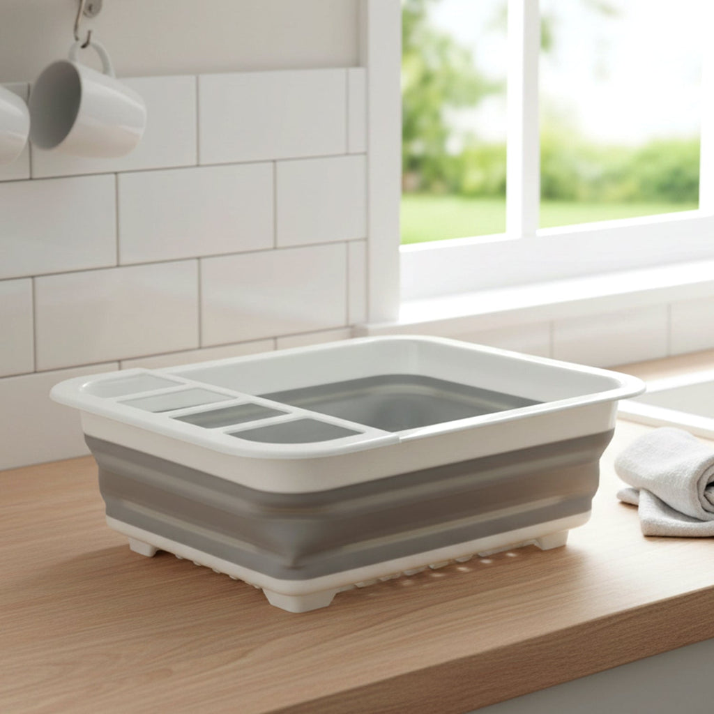 Close-up of foldable plastic dish drying rack compartments