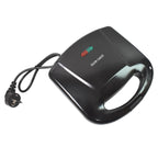 Top-down view of the non-stick Dabster sandwich maker ready for use.