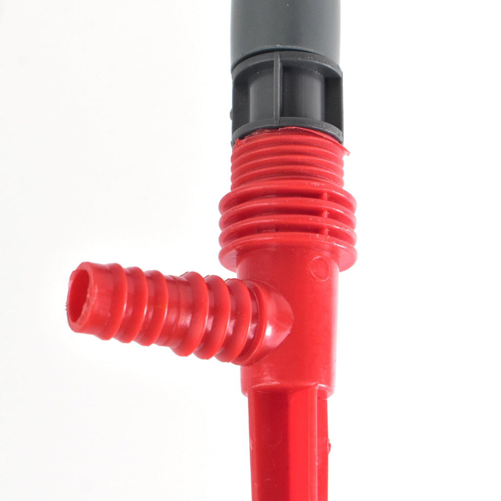 Lawn sprinkler providing wide water coverage on a vibrant green garden lawn.
