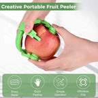Apple cutter with holder ring for stable fruit peeling