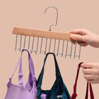Organivo 8-hook space saving hanger made from durable lotus wood, ideal for closet organization.