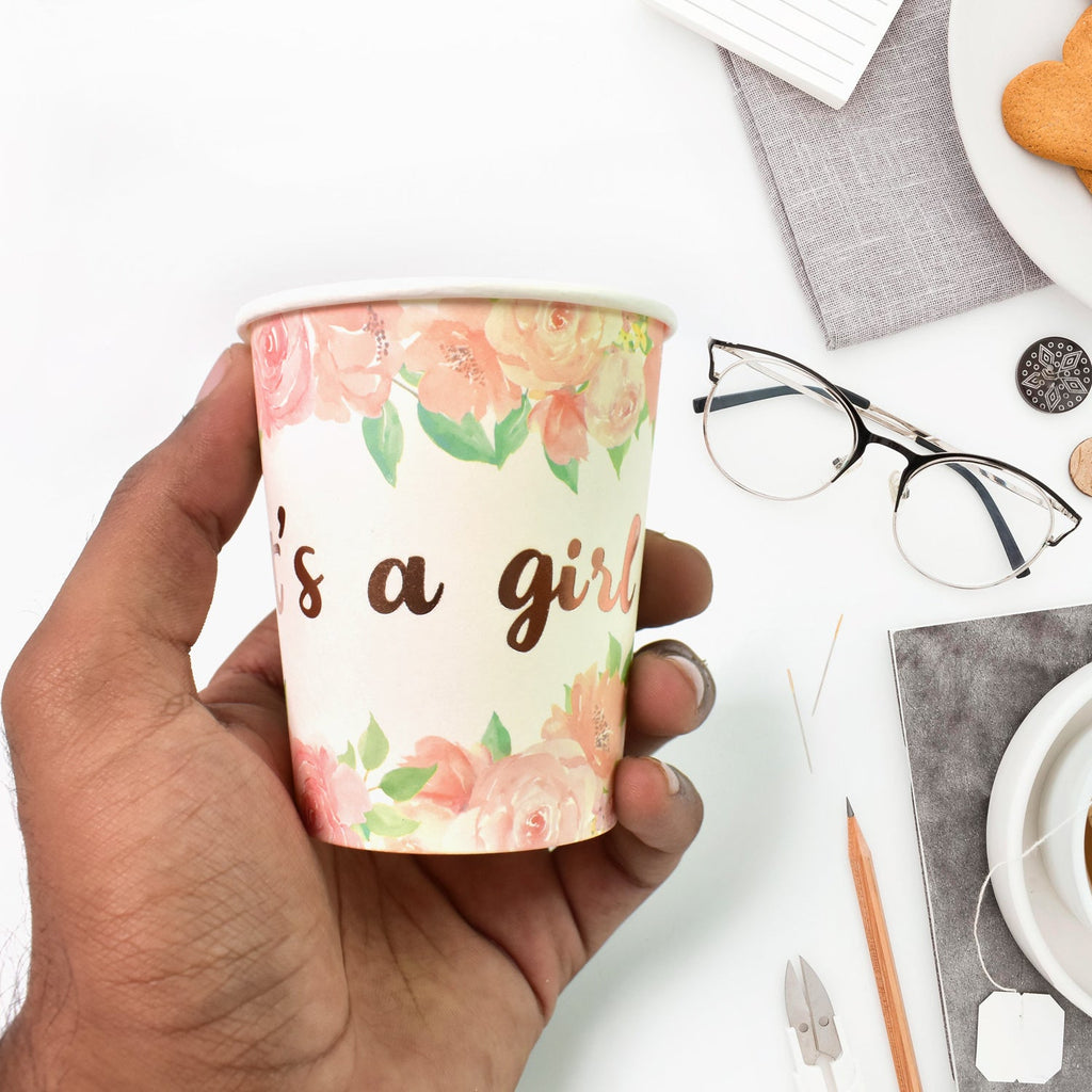 Empty disposable paper cups in a colourful assortment.