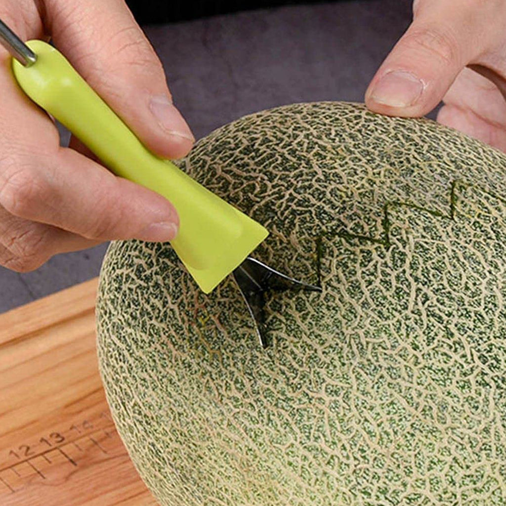 Using the fruit baller to create perfect spheres from a fresh watermelon.