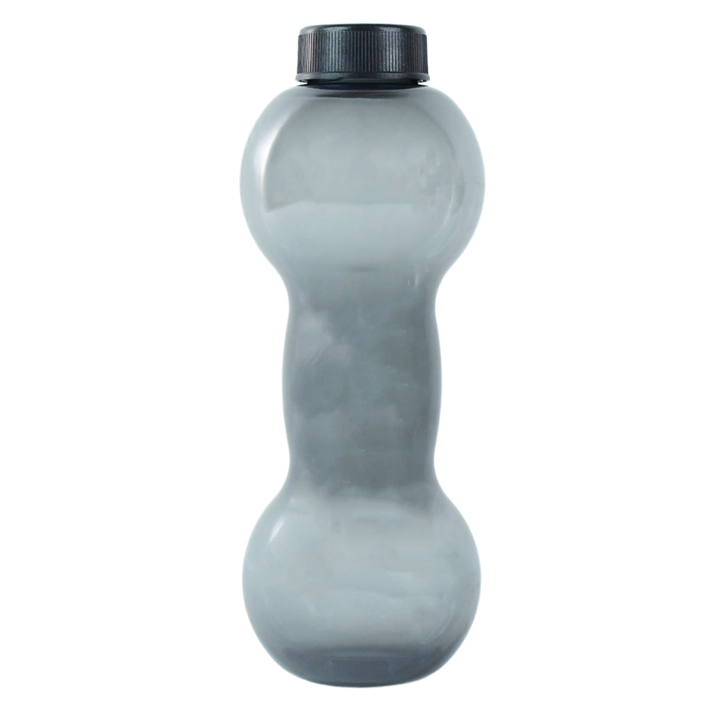 The FitFuzion dumbbell water bottle on a table, ready for your next gym session or daily hydration.