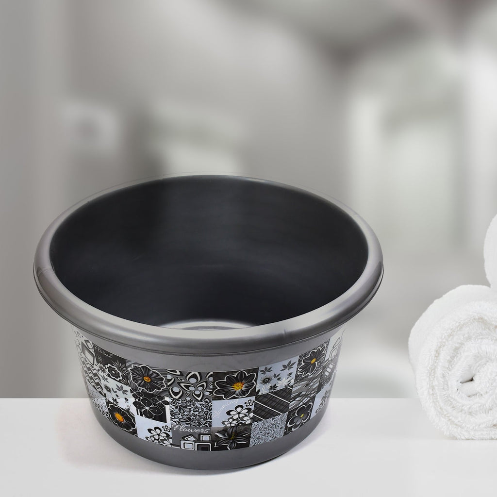 Stylish 7-piece plastic bathroom set displayed, highlighting its floral design and practical items.
