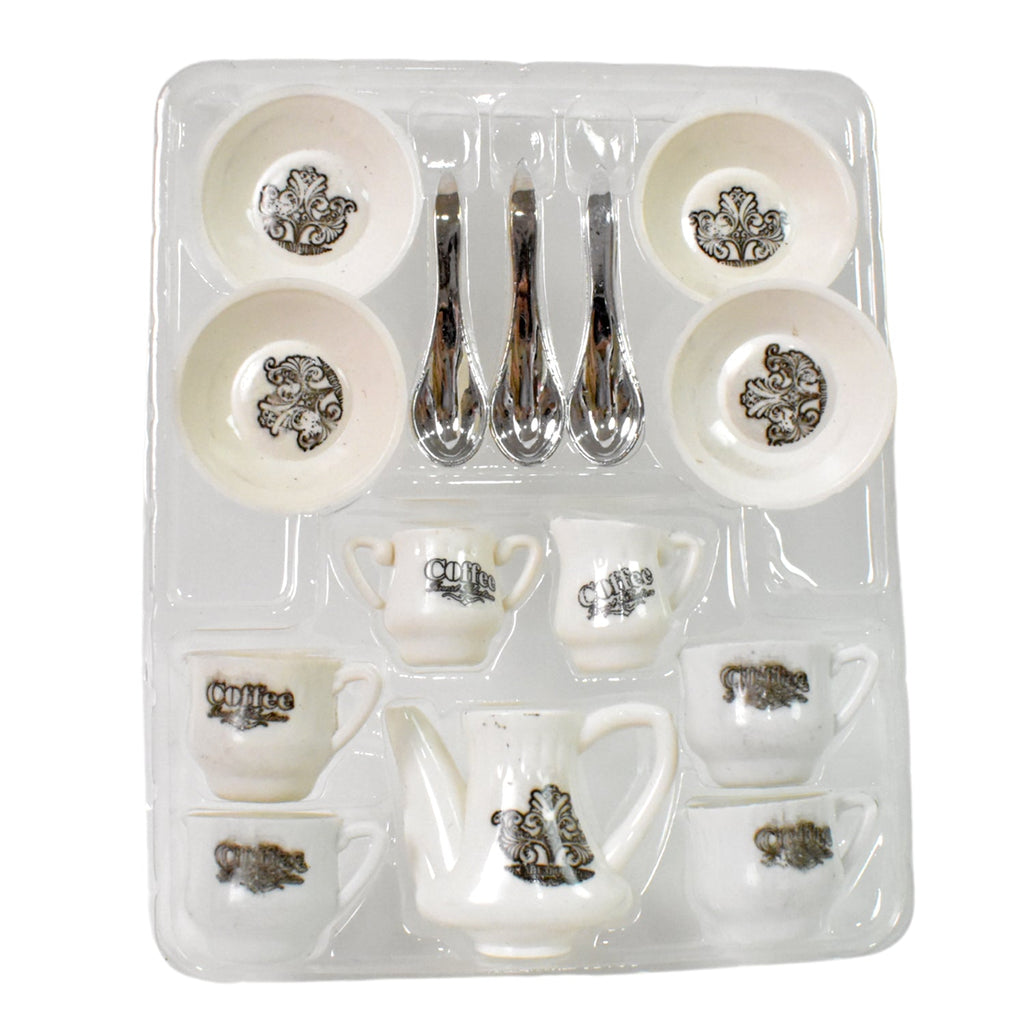 Detailed shot of the miniature plastic serving tray and tea pot.
