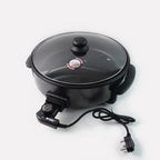 Electric cooker featuring large non-stick cooking surface