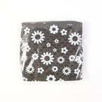 Dustproof LPG cylinder cover featuring black and white floral design