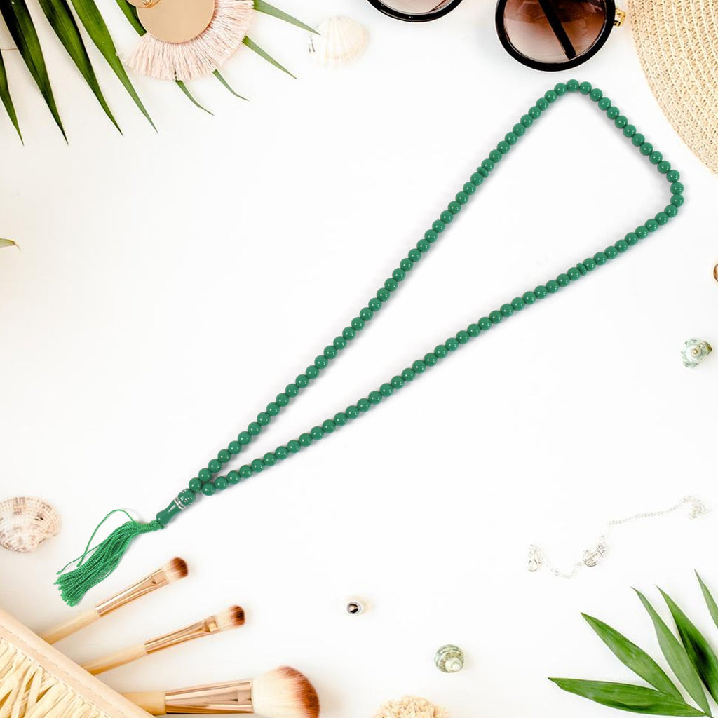 Detailed shot of tasbih prayer beads, emphasizing the craftsmanship.