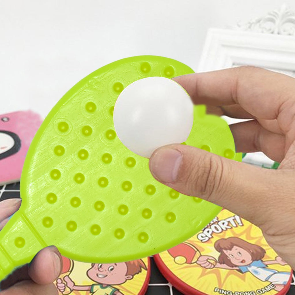 Multiple angles showcasing the complete kids table tennis set with two racquets and a ball.