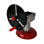 Hands demonstrating the simple and safe operation of the vegetable slicer.