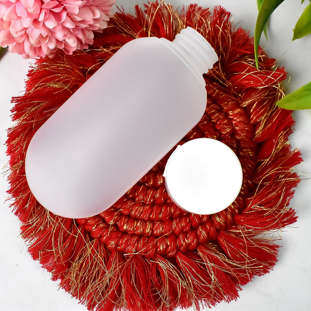 A squeezable 60ml travel bottle with a wide mouth, making refills and cleaning effortless for travelers.