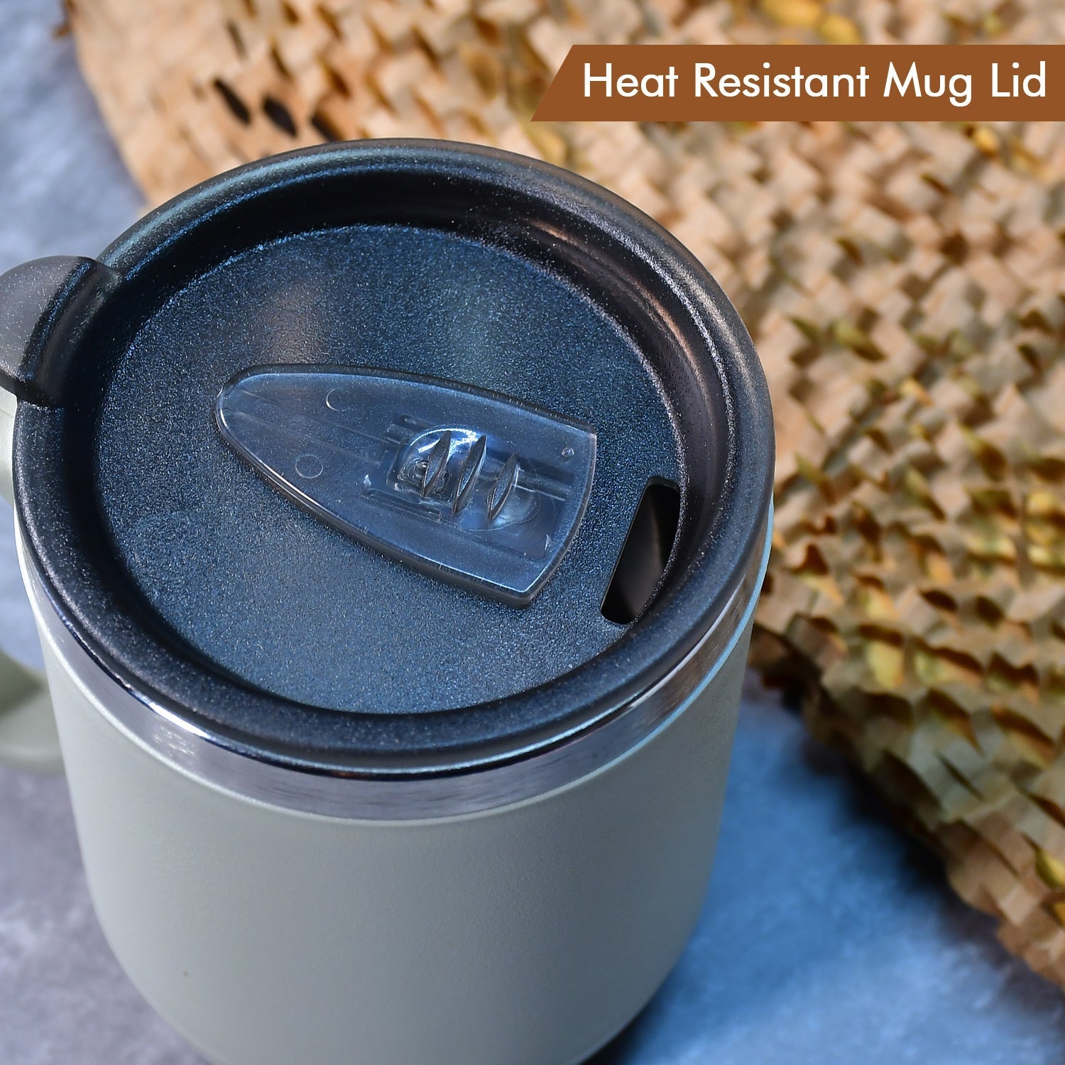 A close-up of the heat-resistant lid on the Ganesh 400ml coffee mug.