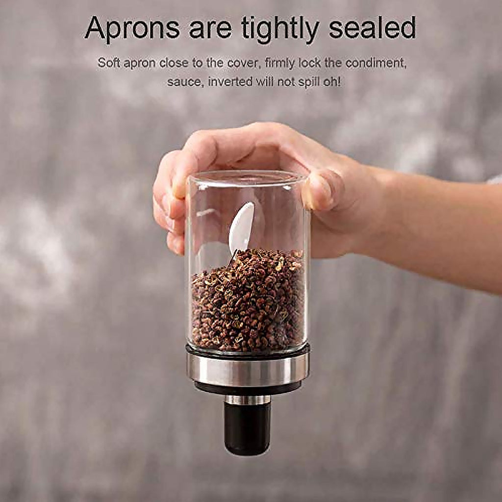 Ergonomic glass spice jar with a black lid, perfect for masalas and seasonings.