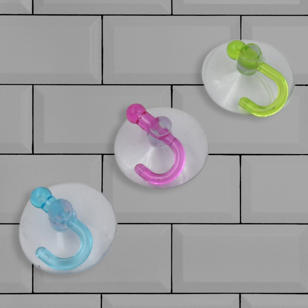 Multiple strong suction cups used for organizing kitchen or bathroom accessories.