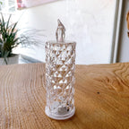 Smokeless LED rose candle in acrylic, showcasing a decorative and safe design.