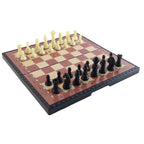 Chess game in progress on compact magnetic folding chess board