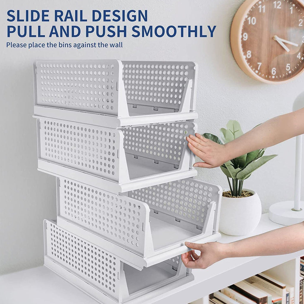 Detailed view of the four plastic drawers, demonstrating the efficient clothes storage solution.