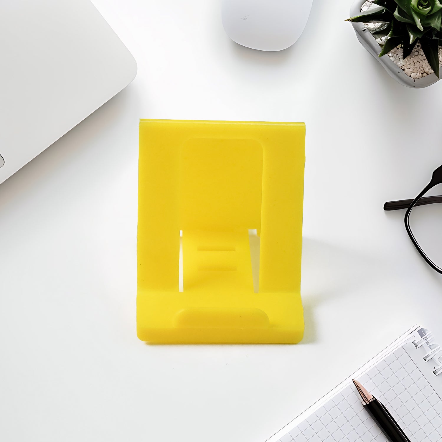 Triangular plastic mobile phone stand in folded compact form