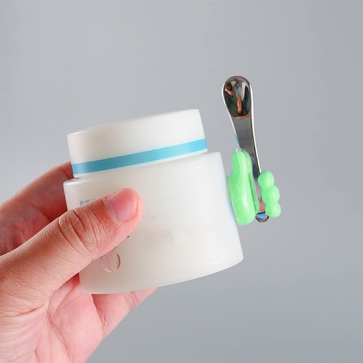Multi-purpose green hand-shaped wall clip holder for home or office