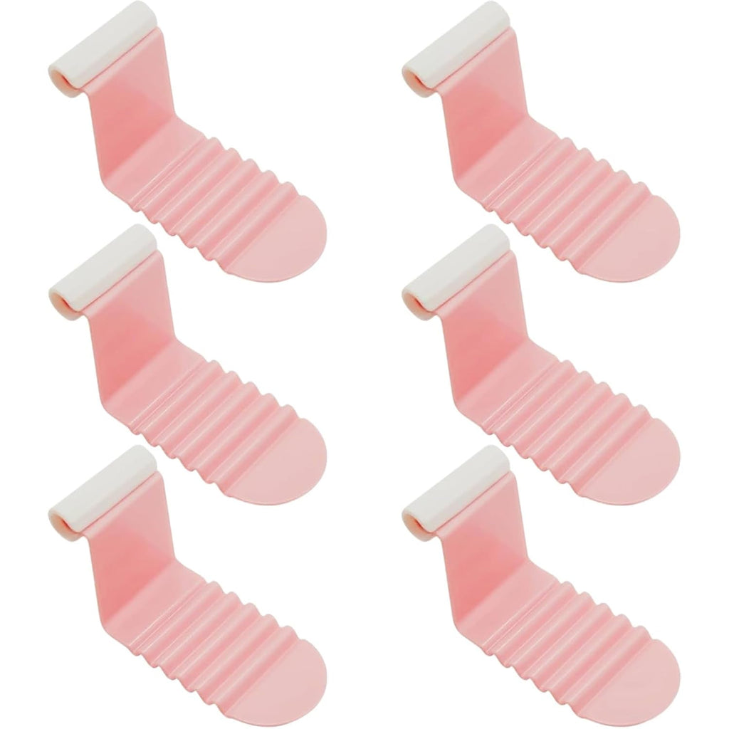 Anti-slip ribbed design bed sheet clips in use for secure sheet hold
