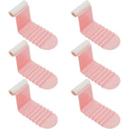Anti-slip ribbed design bed sheet clips in use for secure sheet hold